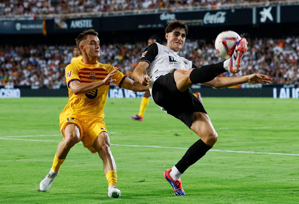 开云体育登录入口-巴塞罗那客场战胜瓦伦西亚,占据积分榜第一